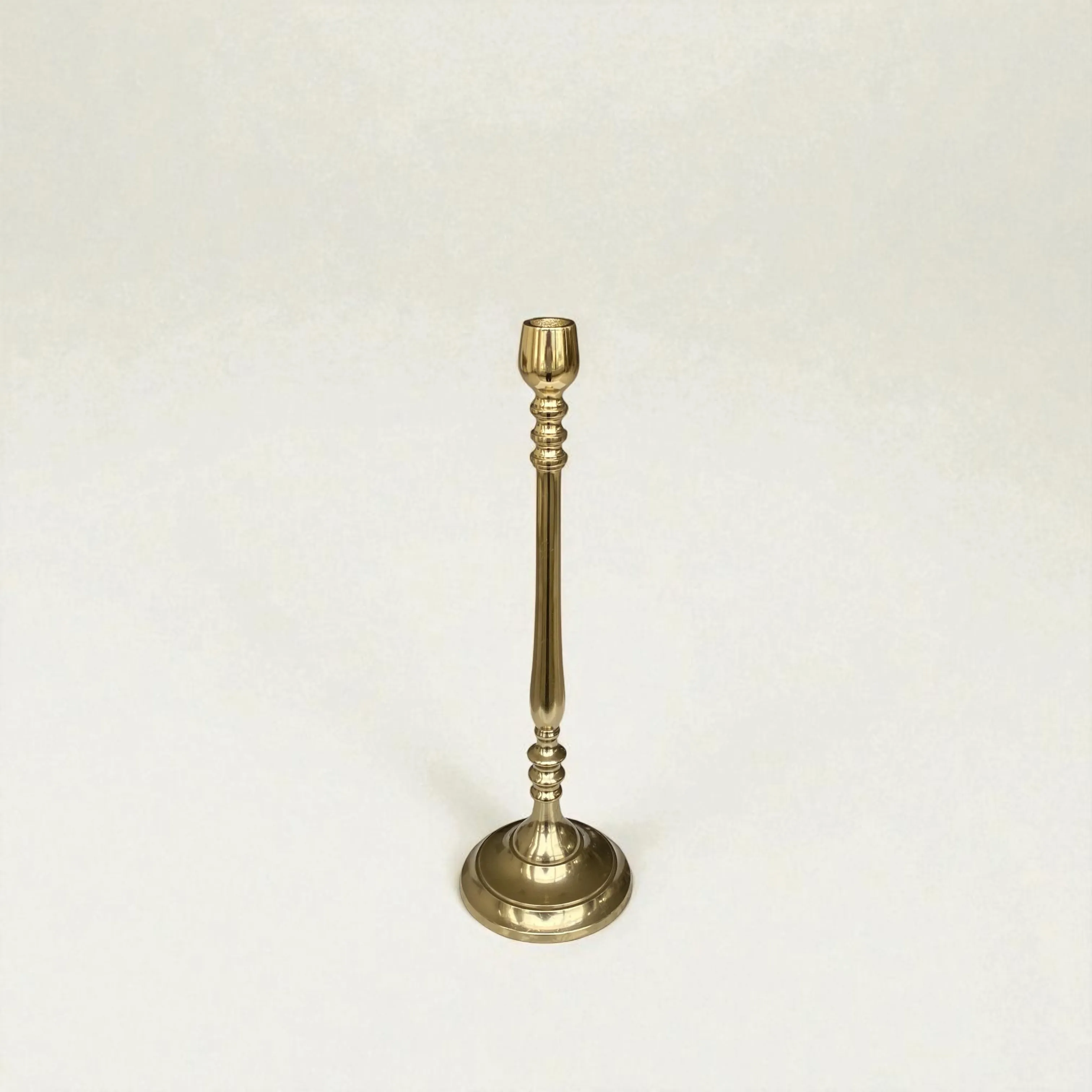 The Candela Brass Holder